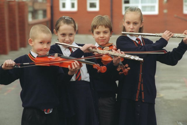Children from Waterloo Primary school with instruments bought with money raised by the Queendeans association. Pictured left to right are Ryan Partington, Natalie Bevan, Mark Podesta and Sarah Grime