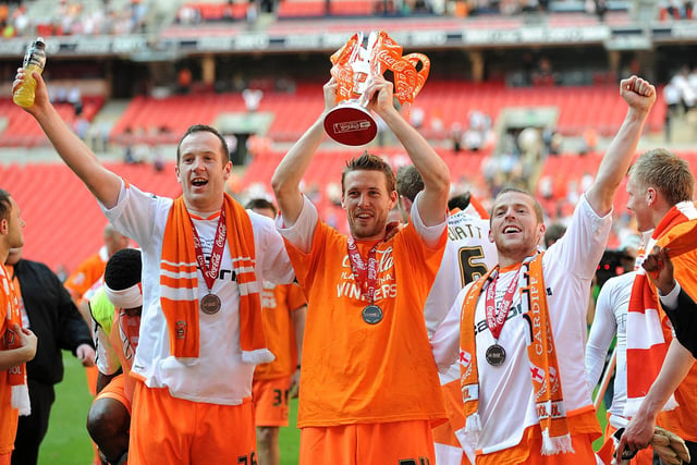 Adam celebrates with Rob Edwards and Billy Clarke at completing the impossible