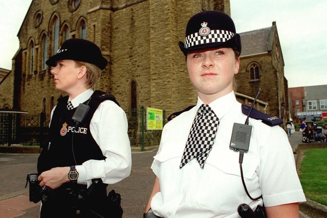 Pictured outside St John's Church are PCs Lindsey Nottingham (left) and Lisa Griffin. They were cracking down on street drinkers. The area was notorious for it.