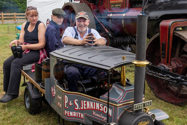 Sandra Jenkinson, Finn Morgan and Paul Jenkinson with this impressive machine at the steam fair.
