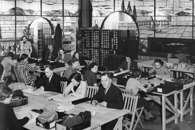 The Pensions Department of the Ministry of Health adapt to their luxurious new offices in the solarium of a Blackpool hotel, 5th January 1940. The entire ministry has been relocated during World War II