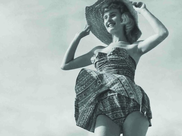 Pat Stewart, wearing her outlandish rafia shoes in shot at Blackpool in 1950
