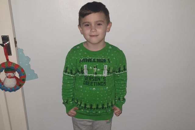 Joshua, age 6, in his Minecraft Christmas jumper.