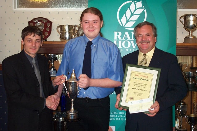 Matthew May (left) and Colin Lomax, (right) of Rank Hovis, present competition winner Matthew Prescott (centre) - a student at Blackpool & The Fylde College - with the 2003 Hovis & Granary Cup and a cheque for £120