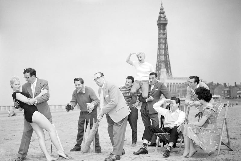 Stars of the Central Pier Show 'Let's Have Fun' enjoy a break in rehearsals with a game of cricket on the sands. Left to right, Babette, Eric Morecambe, Ernie Wise, Jimmy James, The Trio Vedette, David Galbraith, Bretton Woods and Shelley Marshall