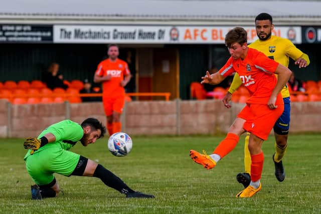 Josh Winder scores the first of his two goals for AFC Blackpool Picture: Adam Gee