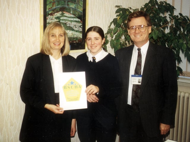 Kathy Ellis, Executive Committee member of Blackpool Self Catering Association; Natalie Bather (winner of Logo 2000 competition) and John McNaughton (Head teacher of Palatine High School