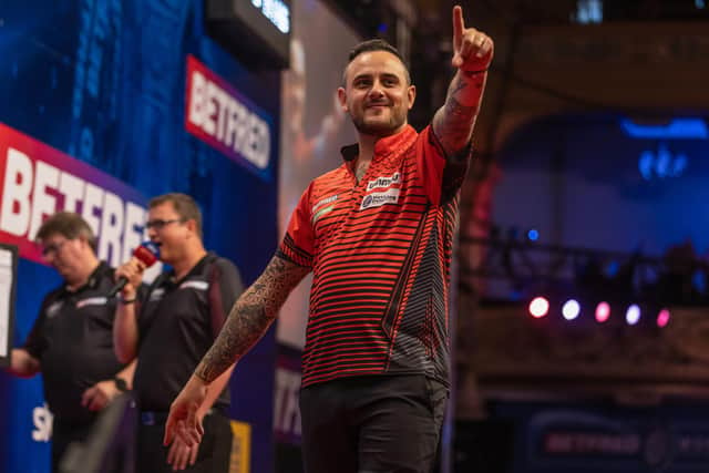 Joe Cullen meets Gerwyn Price in round two of the Betfred World Matchplay after beating Mike De Decker in Blackpool