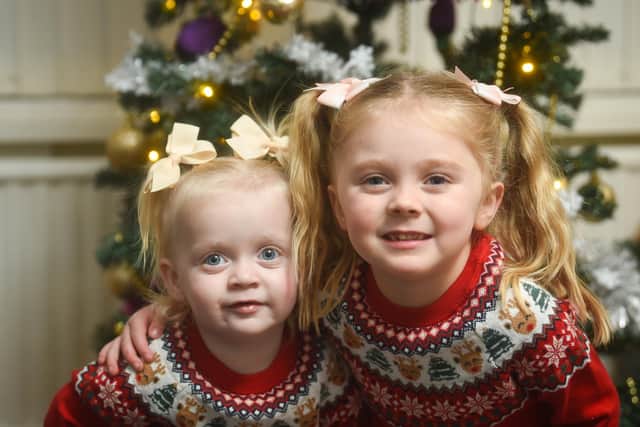 The Whittaker family are getting ready for Evie-Mae's first normal Chirstmas following hospital treatment.  Pictured are sisters Ella-Mae, 4, and Evie-Rae, 2.