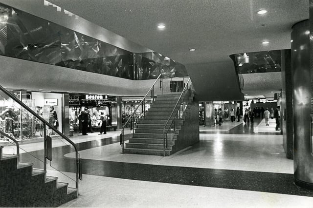 Houndshill shortly before it opened in 1980 showing the stairs leading to the upper level cafe. Also in the pic is Alan Boyson 's stainless steel frieze and ceiling lights