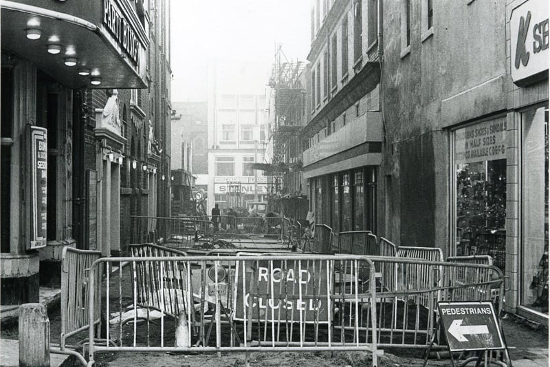 Pedestrianisation under way at the southern end of Corporation Street looking towards Victoria Street with the Grand Theatre on the left, K shoes on the right.The Stanley Cafe in the distance on Victoria Street