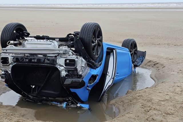 One of the cars on the beach at South Shore.