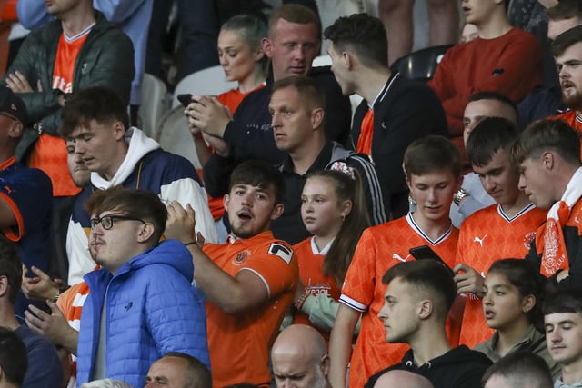 Blackpool fans watch their team in action