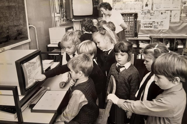 Six and seven-year-olds at Moor Park School in 1983 get to grips with early computing. Some things never change though - the caption on the back reads 'learning to live and work with computers seems to come much more easily to children that adults'. Many will agree that statement is still as valid with today's techy kids