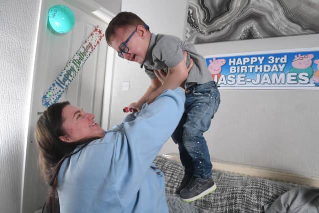 Photo Neil Cross; Jase-James McCready Rogers, celebrates his third birthday with parents, Leah and William