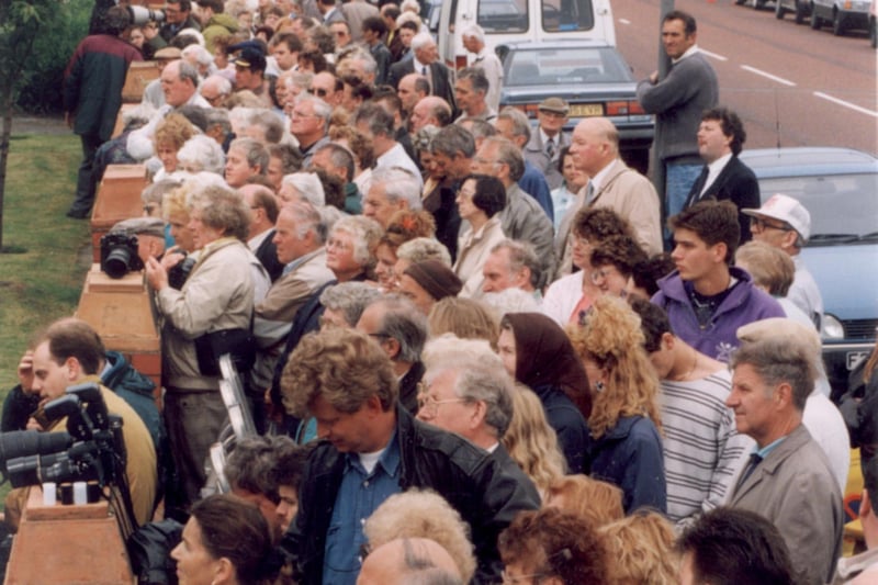 Crowds outside the White Church during the funeral service for Les Dawson