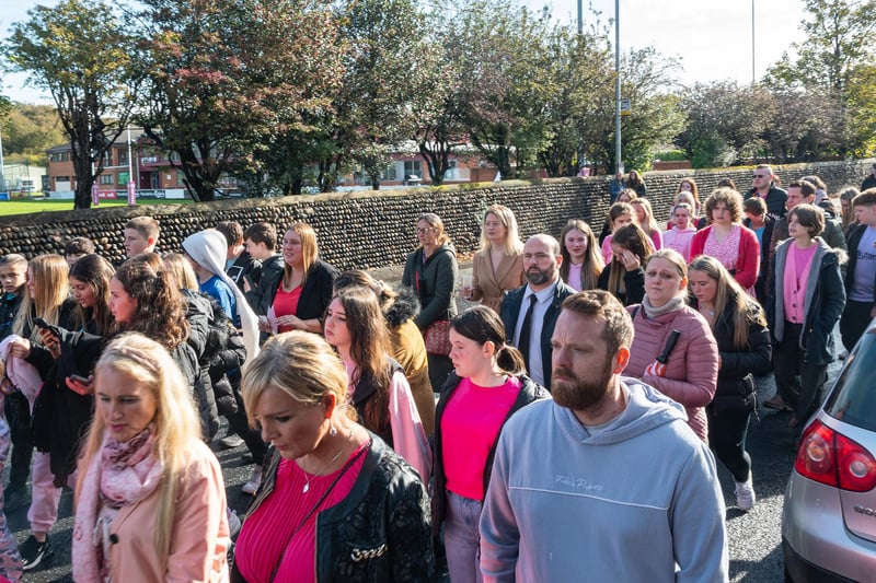 Mourners paid their respect by wearing pink