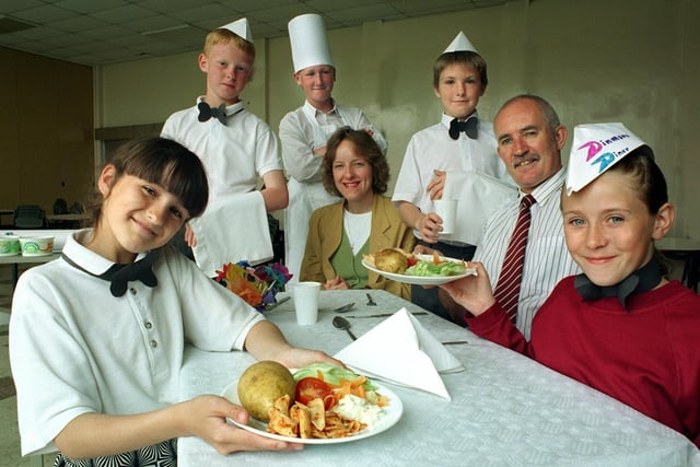 Headteacher Barry Wood from Grange Park Junior School and project co-ordinator Alison Gilchrist, being waited on by Dinmore Diner staff, from left,  Stacey Sutherland, Richard Whalley,  Daniel Grant, Christopher Vandalli and Sara Woodman