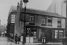 Victoria Street , Blackpool in 1932. These 2 houses, including a small shop, were demolished soon after this photograph was taken to make way for an extension to the Gazette and Herald building which opened in 1934. To the right of these houses was the Trevelyan Hotel, which itself was transformed in later years when it was incorporated into the Gazette complex including the Gazette Stationers. To the left is the Gazette and Herald printworks in Temple Street