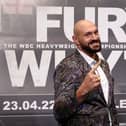 Tyson Fury gestures during the Tyson Fury v Dillian Whyte press conference at Wembley Stadium on March 01, 2022 in Londo