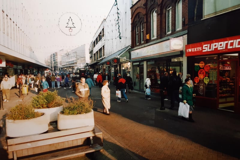 Supercigs, Thorntons WH Smith, Adams, Miss Selfridge, Our Price on a busy Bank Hey Street in December 1991
