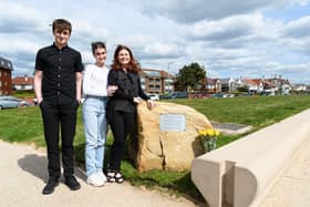 Mike's wife Louise and children Leo and Emily with the plaque tribute.