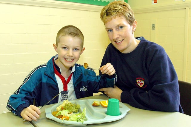 Angela Parker and her son Robson tuck in at Waterloo Primary School