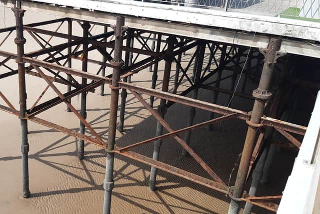 More of the steelwork  at South Pier is now exposed above the sand