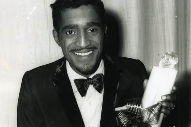Sammy Davis Jnr, was presented with sticks of Blackpool rock for his children when he was in Blackpool for his appearance in the C.A.D.S. Opera House concert in 1963