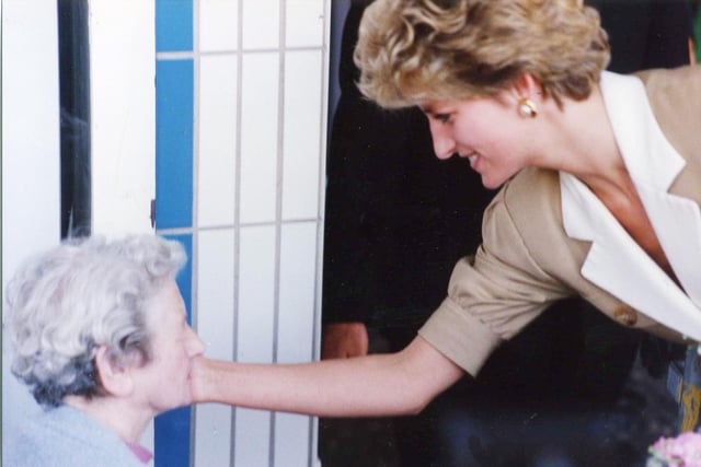 Madge Hargrave of Tarnway Ave, Thornton is comforted by the Princess after feeling faint at Blackpool Winter Gardens in 1992