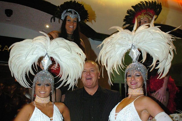Official opening night of Ma Kelly's on Talbot Road in 2010. Manager Mick Sugden with showgirls