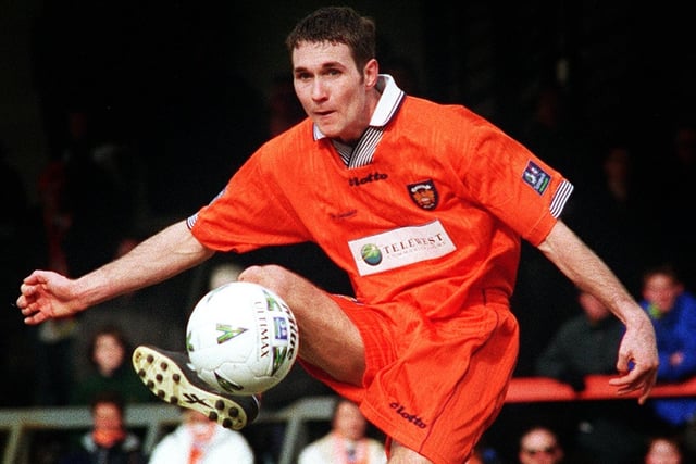 Scott Taylor is pictured here making his debut in the Blackpool v Brentford match in 1998 in which he scored