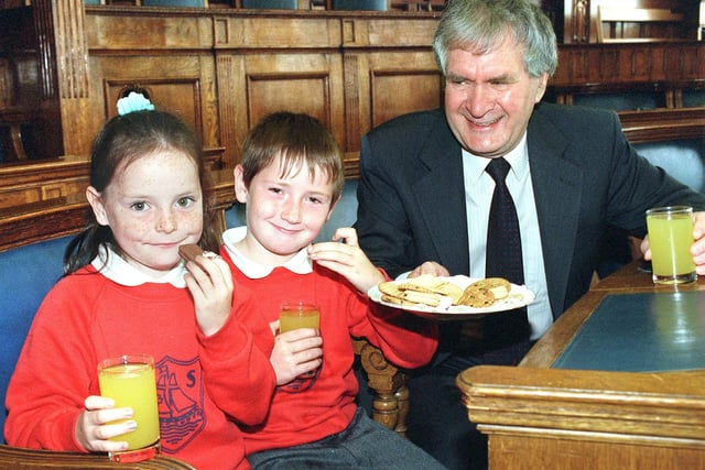 Devonshire Infants School pupils were invited to visit Blackpool's Town Hall in 1999. Six-year-olds Elisha Robinson and Luke Everton enjoy a glass of orange juice and a biscuit, with Council Leader Ivan Taylor.