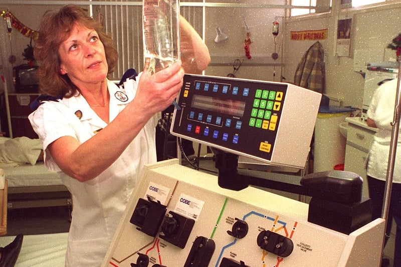 Staff Nurse Barbara Bradley setting up an automatic cell separator