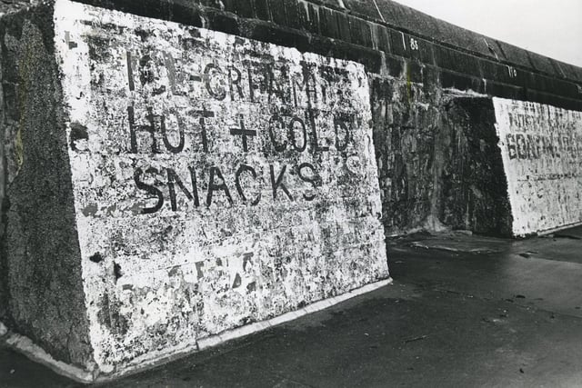 A shadow of it's former glory. Advertising hot and cold snacks and ice-cream provides a glimpse into it's past