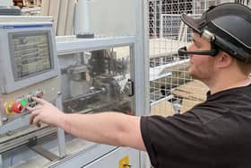 Made Smarter says Lancashire manufacturers must over come barriers to going digital. Here a machine operator at JTAPE tests out handsfree smart glasses