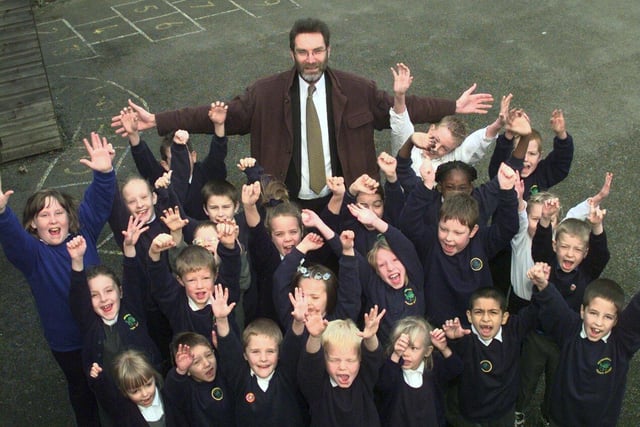 Headteacher Gordon Hamliton and pupils at Mosborough Primary who were celebrating in 1999 after hearing they were getting a new school in the new year