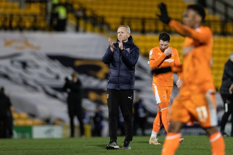 Neil Critchley and the players applauded the travelling supporters at full time.