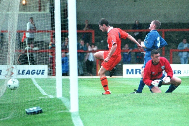 James Quinn scores Blackpool's second goal against Rochdale in 1997