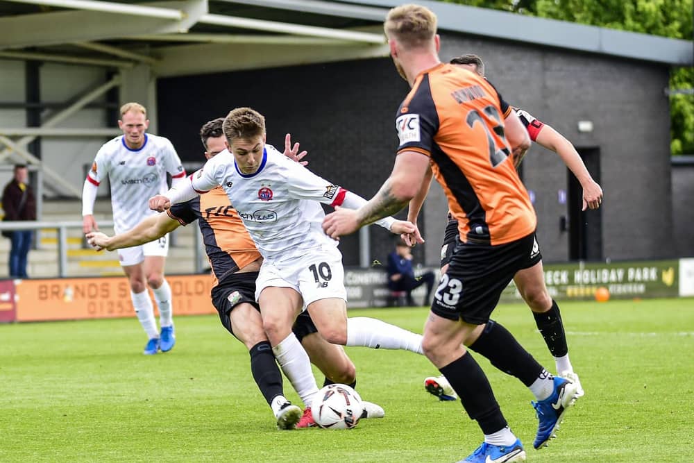 AFC Fylde's Nick Haughton in possession during their defeat to Barnet Photo: AFC Fylde