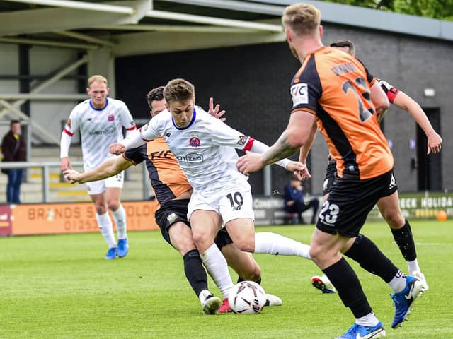 AFC Fylde's Nick Haughton in possession during their defeat to Barnet Photo: AFC Fylde