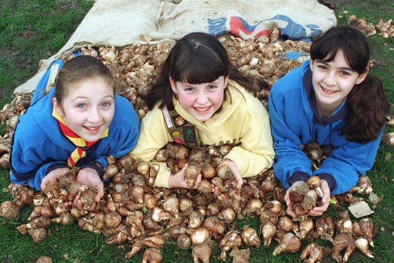 Children from the 19th Blackpool Guides and the 27th Revo Brownies planted bulbs at Stanley Park, 1997. Left to right Sarah Lockwood 12, Emma Inglis 10 and Helena Lockwood 10