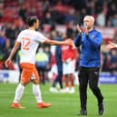 NOTTINGHAM, ENGLAND - OCTOBER 16: Blackpool Head Coach Neil Critchley applauds the Blackpool fans after the final whistle during the Sky Bet Championship match between Nottingham Forest and Blackpool at City Ground on October 16, 2021 in Nottingham, England. (Photo by Tony Marshall/Getty Images)