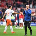 NOTTINGHAM, ENGLAND - OCTOBER 16: Blackpool Head Coach Neil Critchley applauds the Blackpool fans after the final whistle during the Sky Bet Championship match between Nottingham Forest and Blackpool at City Ground on October 16, 2021 in Nottingham, England. (Photo by Tony Marshall/Getty Images)