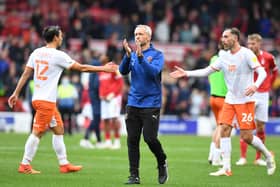 NOTTINGHAM, ENGLAND - OCTOBER 16: Blackpool Head Coach Neil Critchley applauds the Blackpool fans after the final whistle during the Sky Bet Championship match between Nottingham Forest and Blackpool at City Ground on October 16, 2021 in Nottingham, England. (Photo by Tony Marshall/Getty Images)