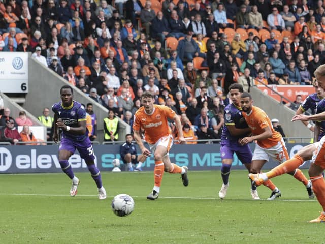 Jordan Rhodes scored a hat-trick in Blackpool's victory over Reading