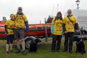 Kate and Darren Collins and their dog Roo (left) and Michelle and James Stannard with Sam ready to Leg It For the Lifeboats