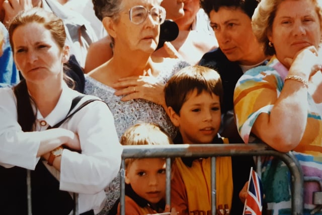 Crowds gather outside the Tower for a glimpse of Queen Elizabeth in 1994