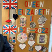 A Fleetwood Hall resident called Kenneth (no surname supplied) with part of the home's memorial display to the late Queen.