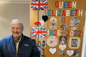 A Fleetwood Hall resident called Kenneth (no surname supplied) with part of the home's memorial display to the late Queen.